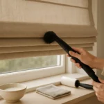 Fabric Roman shades being cleaned